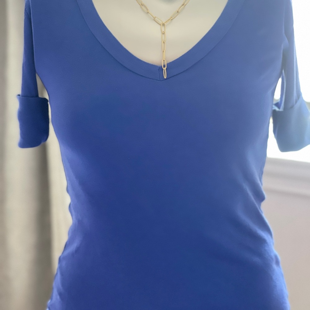 Sharon Segal blue fitted V Neck top. XS